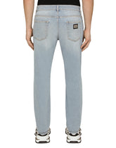 WASHED STRETCH DENIM SLIM JEANS - | Dolce & Gabbana