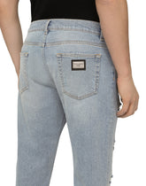 WASHED STRETCH DENIM SLIM JEANS - | Dolce & Gabbana