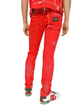 Overdyed slim-fit stretch jeans with abrasions - | Dolce & Gabbana