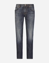 Slim fit washed stretch jeans with subtle abrasions - | Dolce & Gabbana