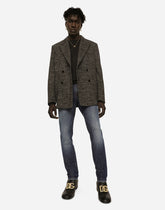 Slim fit washed stretch jeans with subtle abrasions - | Dolce & Gabbana