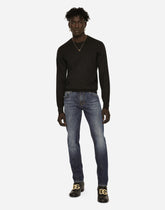 Slim fit washed stretch jeans with subtle abrasions - | Dolce & Gabbana