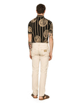 Stretch denim jeans with raw hem details - | Dolce & Gabbana