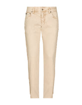 Stretch denim jeans with raw hem details - | Dolce & Gabbana