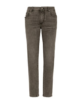 Slim fit stretch denim jeans with subtle abrasions - | Dolce & Gabbana