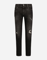 Slim-fit gray stretch denim jeans with abrasions - | Dolce & Gabbana