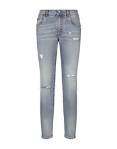 Slim-fit blue stretch denim jeans with abrasions - | Dolce & Gabbana