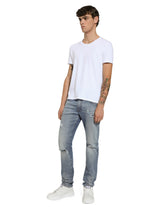 Slim-fit blue stretch denim jeans with abrasions - | Dolce & Gabbana