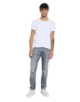 Slim-fit blue stretch denim jeans with abrasions - | Dolce & Gabbana