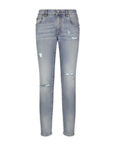 Slim-fit blue stretch denim jeans with abrasions - | Dolce & Gabbana