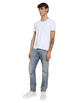 Slim-fit blue stretch denim jeans with abrasions - | Dolce & Gabbana