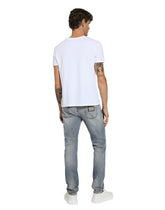 Slim-fit blue stretch denim jeans with abrasions - | Dolce & Gabbana