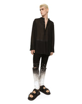 Slim-fit stretch jeans with brushstrokes and DG logo - | Dolce & Gabbana