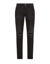 Washed black skinny stretch jeans - | Dolce & Gabbana