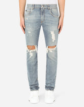 Blue wash skinny stretch jeans with rips - | Dolce & Gabbana