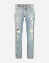 Blue wash skinny stretch jeans with rips - | Dolce & Gabbana