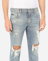 Blue wash skinny stretch jeans with rips - | Dolce & Gabbana