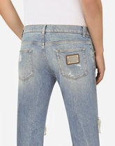 Blue wash skinny stretch jeans with rips - | Dolce & Gabbana