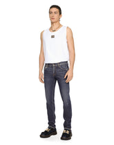 Mid blue skinny stretch jeans with abrasions - | Dolce & Gabbana