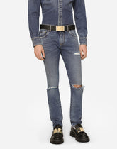 Light blue skinny stretch jeans with rips - | Dolce & Gabbana