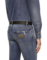 Light blue skinny stretch jeans with rips - | Dolce & Gabbana