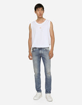 Light blue skinny stretch jeans with rips - | Dolce & Gabbana
