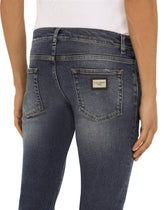 SKINNY STRETCH WASHED JEANS WITH SMALL ABRASIONS - | Dolce & Gabbana