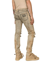 Overdyed skinny fit stretch jeans with rips - | Dolce & Gabbana