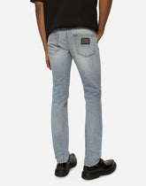 Skinny washed stretch denim jeans - | Dolce & Gabbana