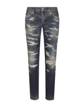Skinny stretch denim jeans with abrasion details - | Dolce & Gabbana