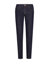 Skinny stretch denim jeans with flocked logo tag - | Dolce & Gabbana