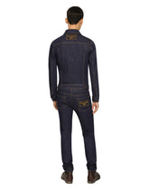 Skinny stretch denim jeans with flocked logo tag - | Dolce & Gabbana