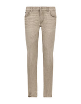 Washed stretch denim jeans with abrasions - | Dolce & Gabbana