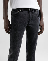 Skinny jeans in stretch cotton with plaque - | Dolce & Gabbana