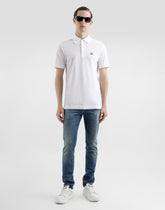 Skinny stretch cotton jeans with tag - | Dolce & Gabbana