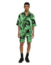 Stretch cotton shorts with banana tree print - | Dolce & Gabbana