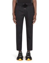 WOOL JOGGING PANTS WITH PLATE DETAIL - | Dolce & Gabbana