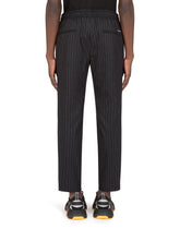 WOOL JOGGING PANTS WITH PLATE DETAIL - | Dolce & Gabbana