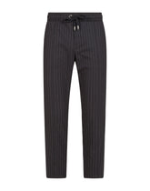 WOOL JOGGING PANTS WITH PLATE DETAIL - | Dolce & Gabbana