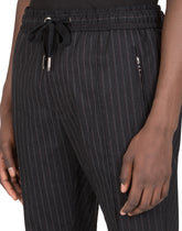 WOOL JOGGING PANTS WITH PLATE DETAIL - | Dolce & Gabbana