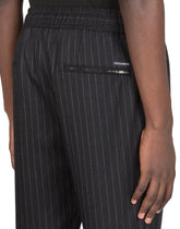 WOOL JOGGING PANTS WITH PLATE DETAIL - | Dolce & Gabbana