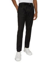 Wool jogging pants with tag - | Dolce & Gabbana