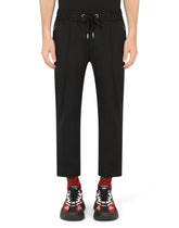 Stretch cotton jogging pants with tag - | Dolce & Gabbana
