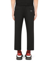 Stretch cotton jogging pants with tag - | Dolce & Gabbana