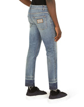 Blue wash skinny stretch jeans with rips - | Dolce & Gabbana