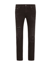 Black skinny stretch jeans with repaired rips - | Dolce & Gabbana