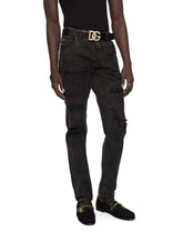 Black regular-fit jeans with rips - | Dolce & Gabbana