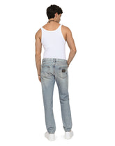 Light blue regular-fit stretch jeans with rips - | Dolce & Gabbana