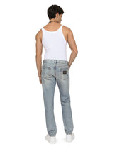 Light blue regular-fit stretch jeans with rips - | Dolce & Gabbana