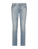 Regular fit washed stretch denim jeans with abrasions - | Dolce & Gabbana